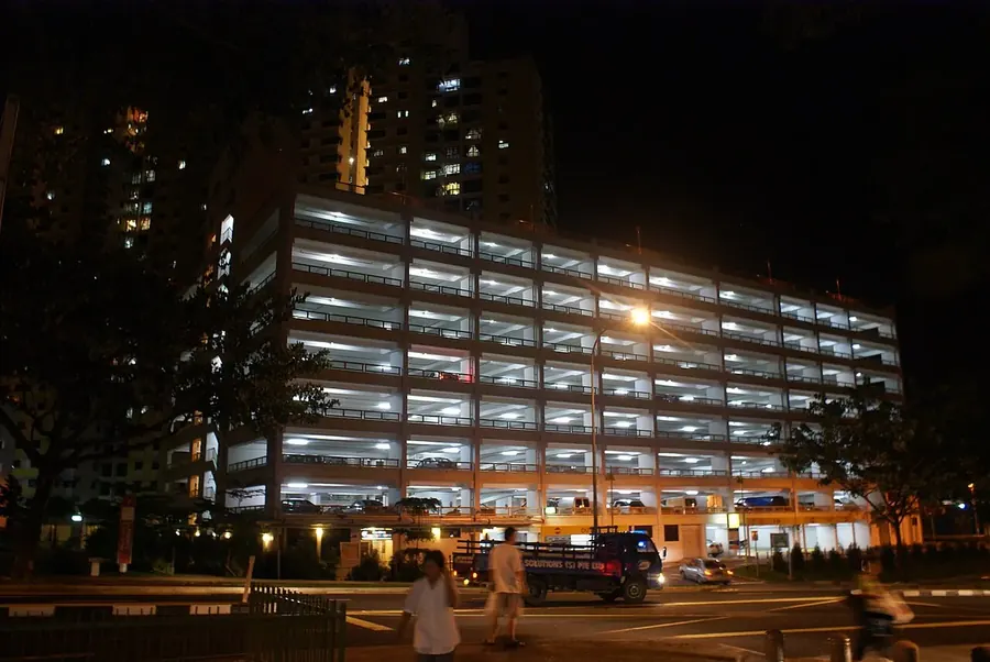 A multi storey carpark in Singapore lit up at night