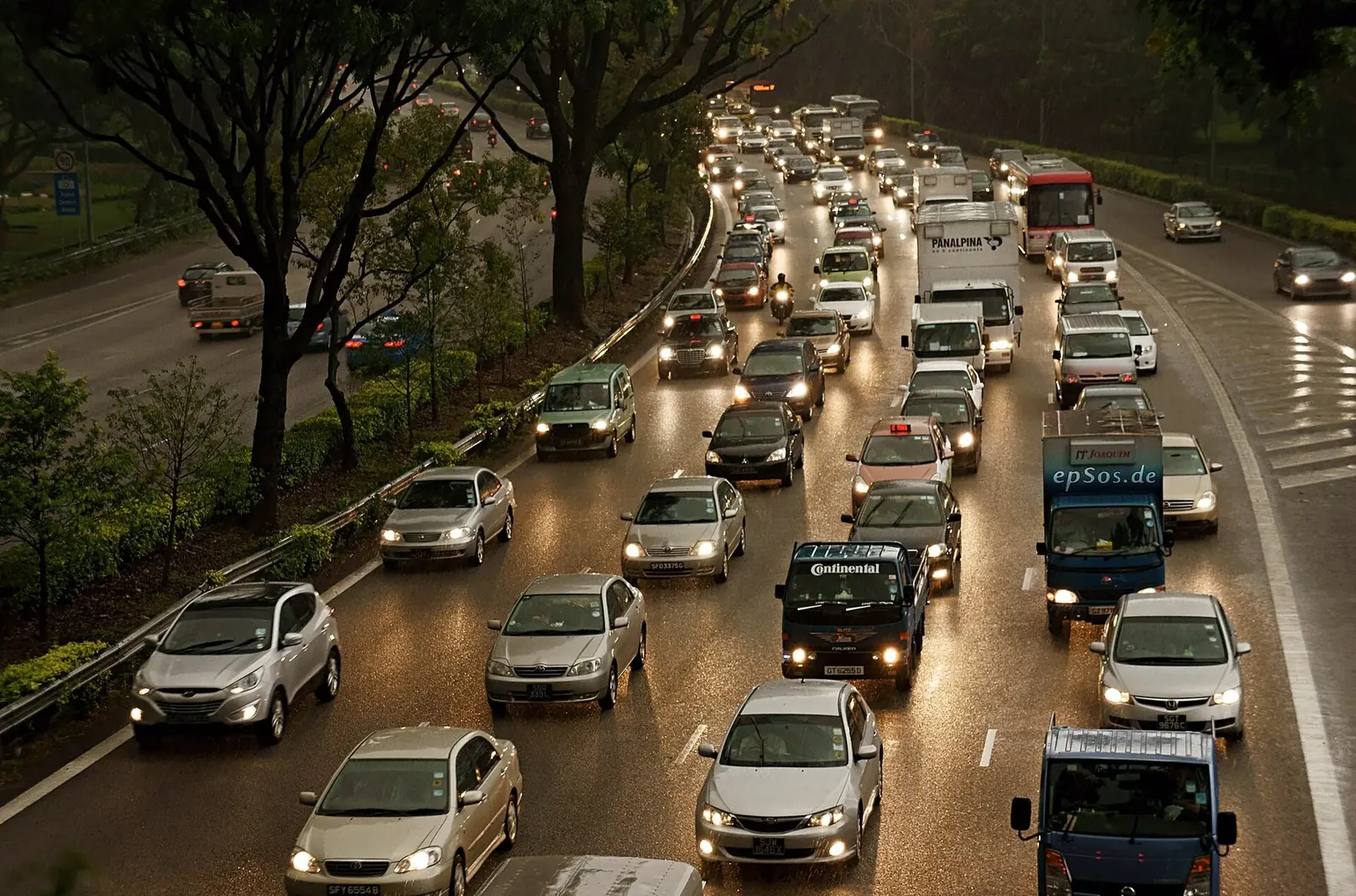 Cars queuing in slow traffic